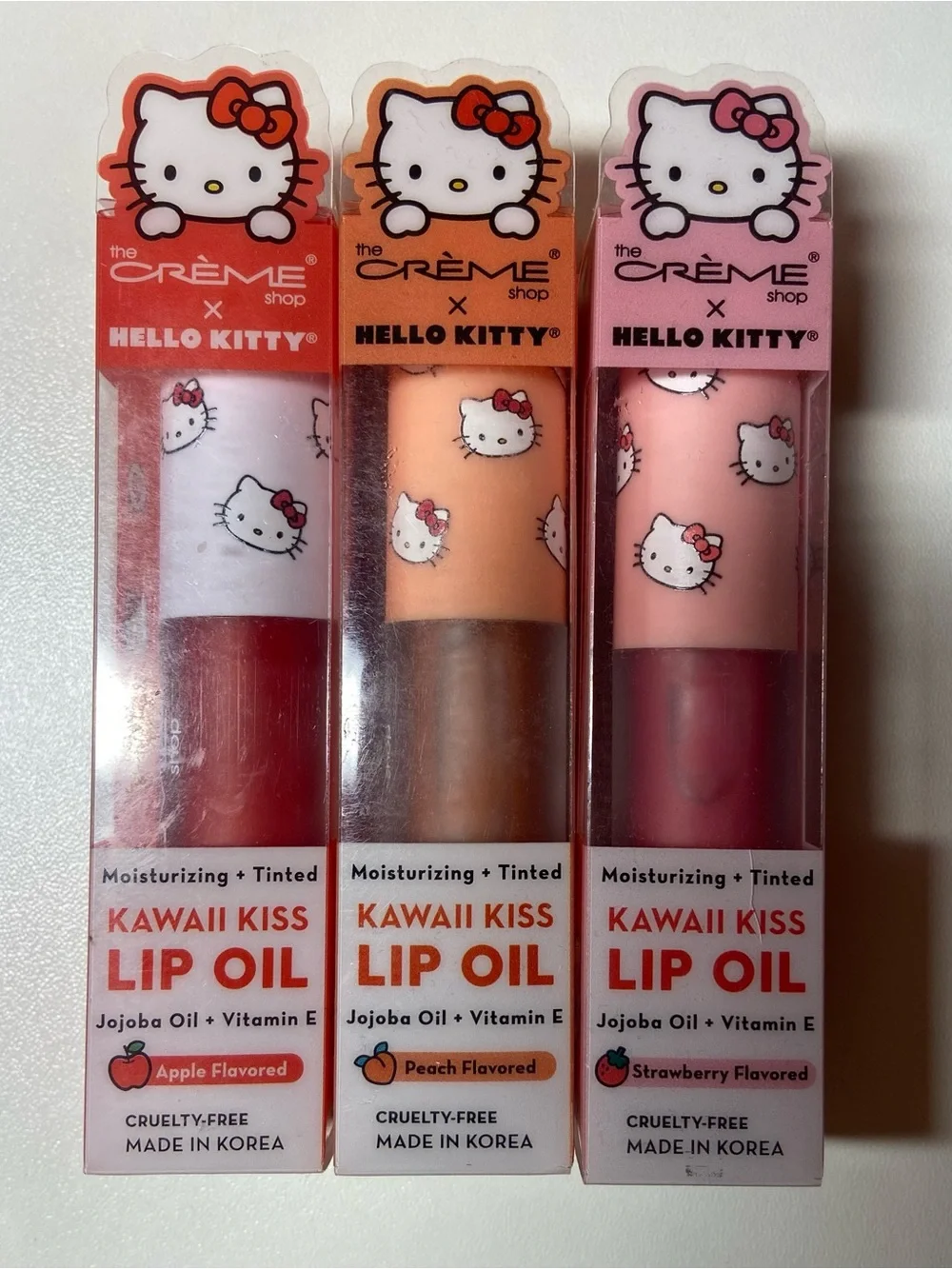 The Crème Shop x Hello Kitty Kawaii Kiss Lip Oil Trio - Red, Peach, Pink